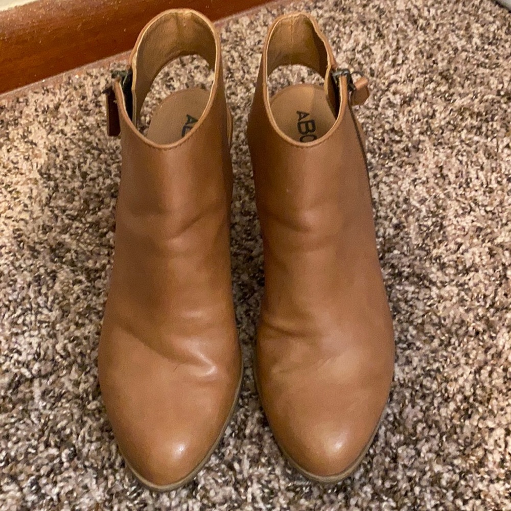 Short heel booties with open heel